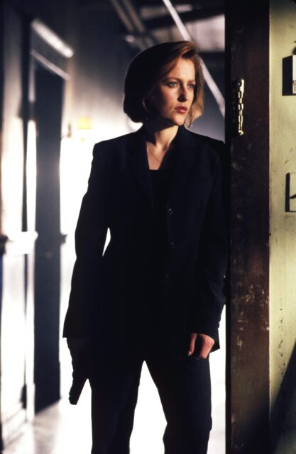 Gillian Anderson as Dana Scully.