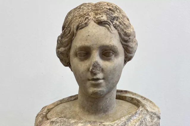 A Roman female marble bust.