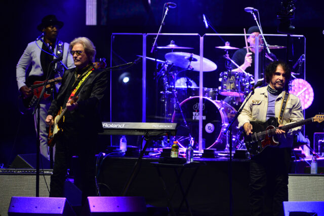Daryl Hall and John Oates performing on stage.
