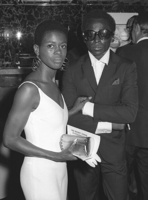 Cicely Tyson and Miles Davis standing beside each other.