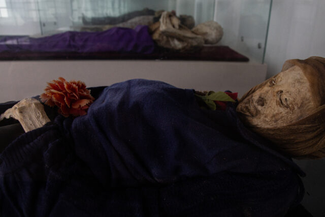 A mummified body on display.
