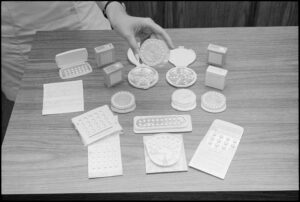flat lay display of various birth control packages in 1968