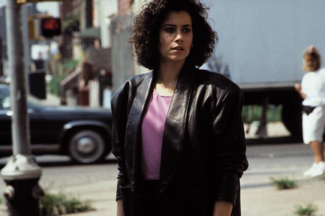 Lorraine Bracco playing Karen Hill in Goodfellas, walking on the street.