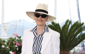 Meryl Streep in a hat and sunglasses.
