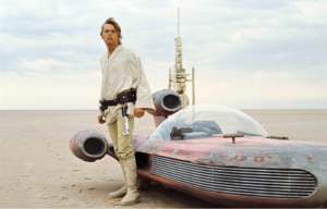 Mark Hamill in front of a space ship in "Star Wars."