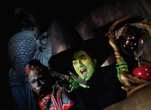The Wicked Witch of the West beside a flying monkey in "The Wizard of Oz"
